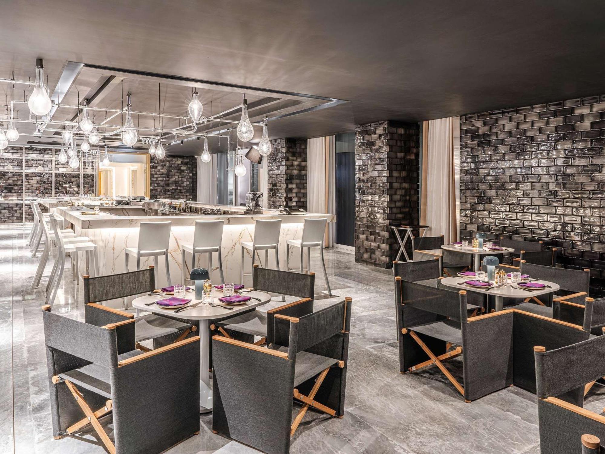 Fairmont Doha Hotel Lusail Ngoại thất bức ảnh The interior of the restaurant